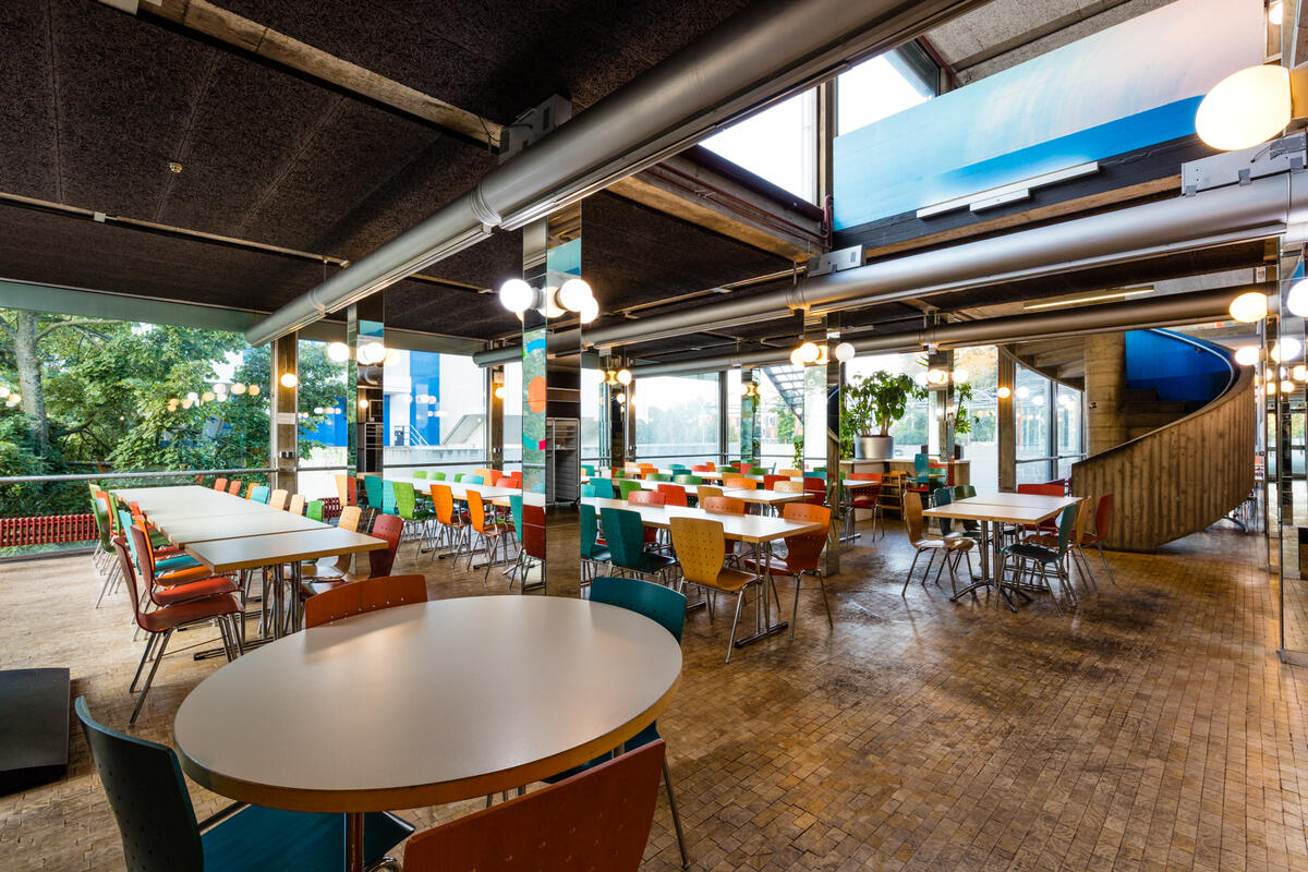 Dining room with tables and chairs in the cafeteria Denkpause