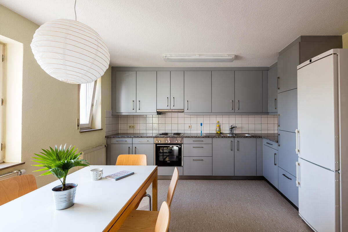 Kitchen with table and chairs in Straußäcker 2