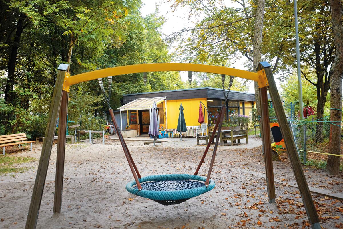 Garden with swing in children house Uni-Kids